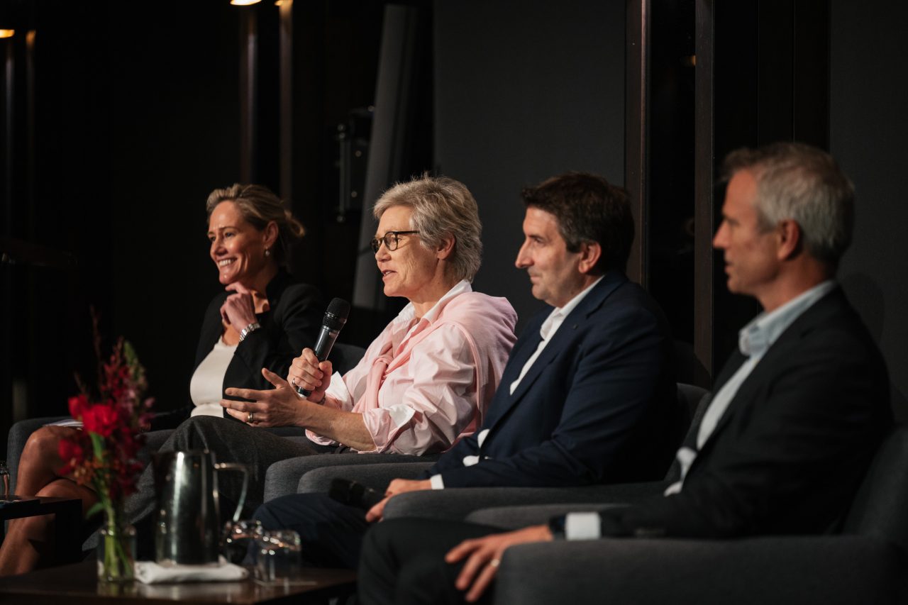 Corporate panel of four people 